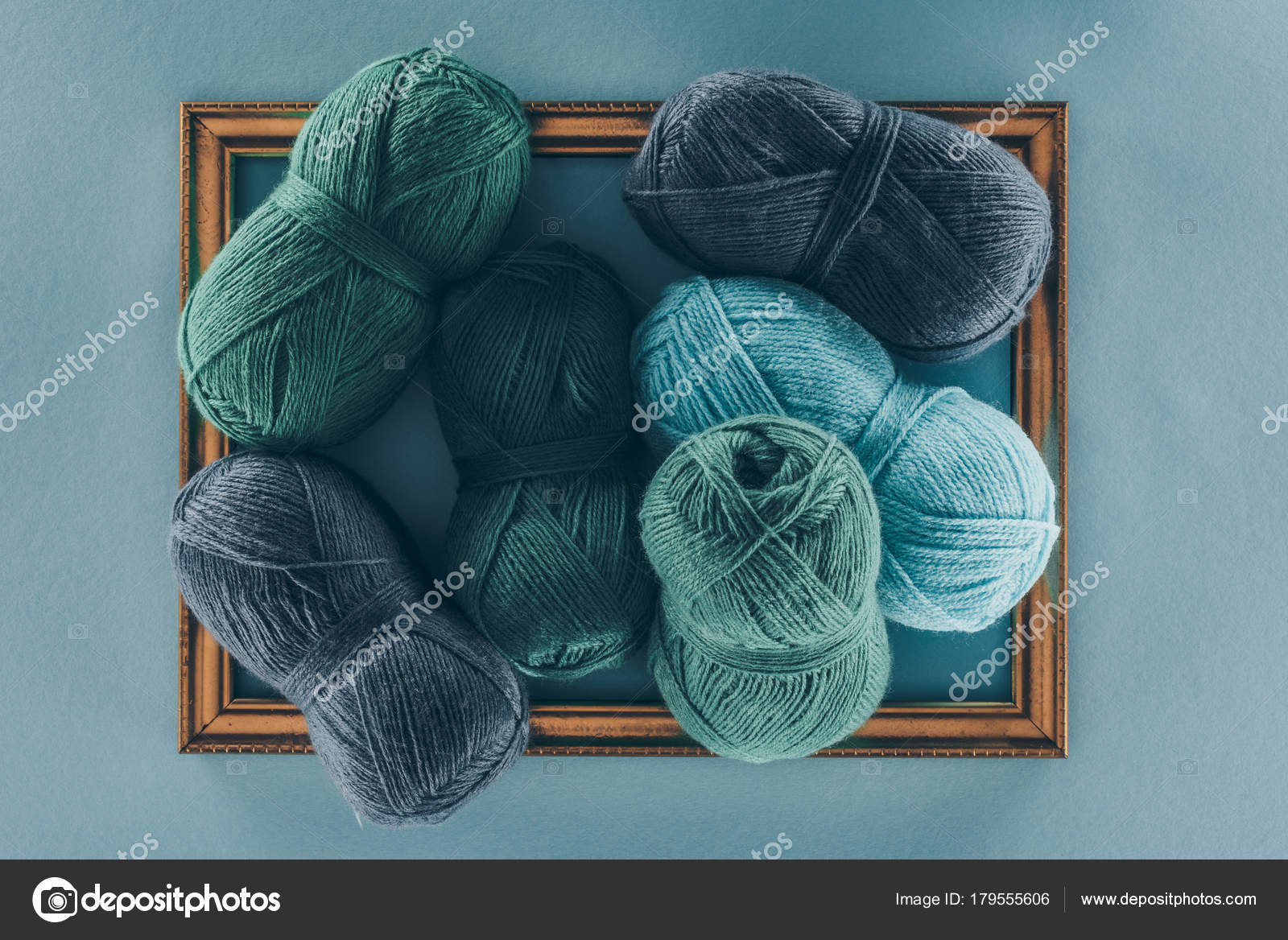 Top View Blue Green Knitting Wool Balls Frame Isolated Blue Stock Photo by ©VadimVasenin 179555606