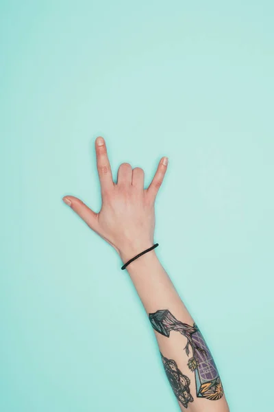 Cropped Shot Woman Showing Horns Sign Isolated Turquoise — Stock Photo, Image
