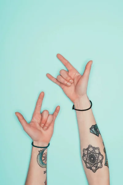 Cropped Shot Woman Showing Horns Signs Hands Isolated Turquoise — Stock Photo, Image