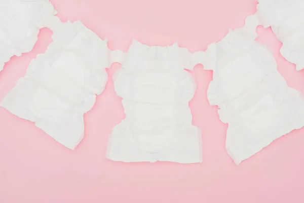 Top View Clean Unused Baby Diapers Isolated Pink — Stock Photo, Image