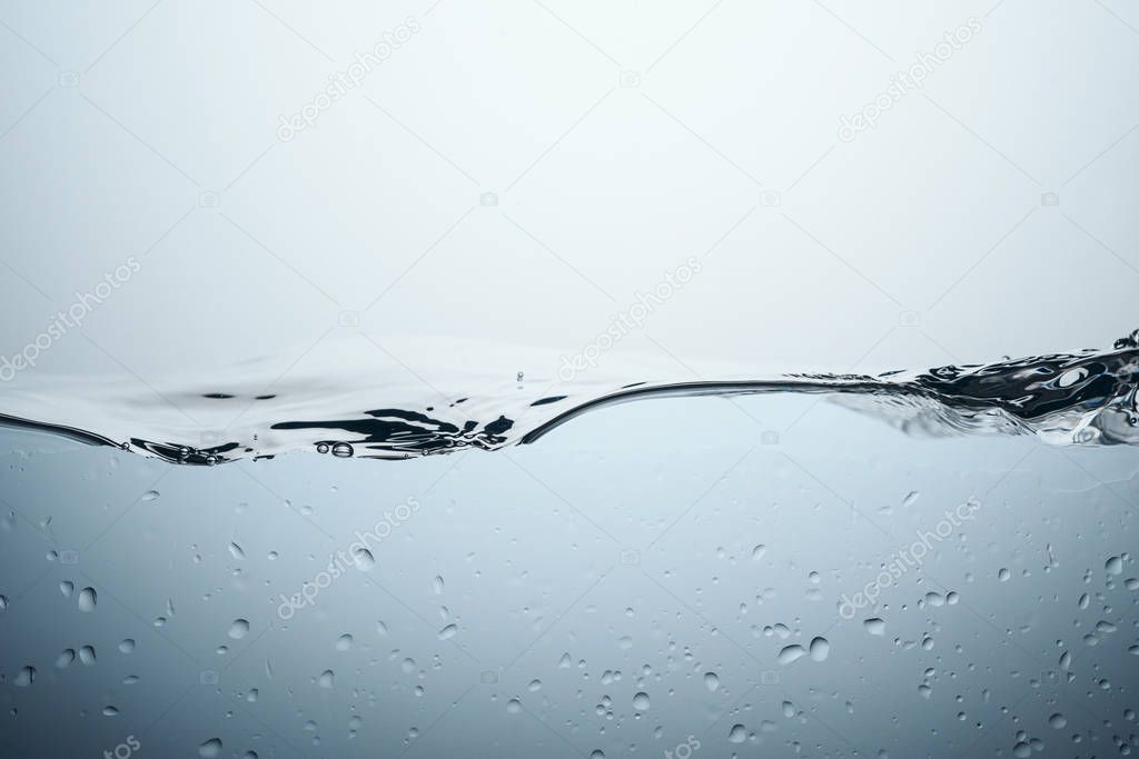 minimalistic texture with water splash and drops, isolated on white