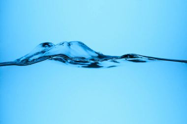 pure flowing water texture, isolated on blue