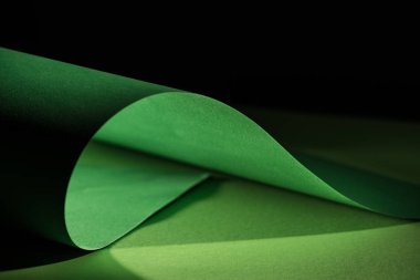 green warping paper for decoration on black  clipart