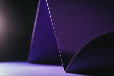 close up view of purple paper on black clipart