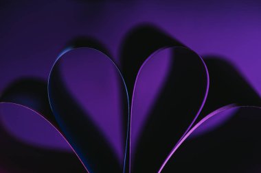 warping purple paper in shape of flower clipart