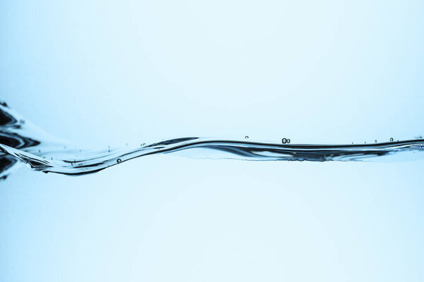 flowing water with bubbles, isolated on white