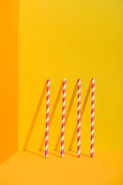 White Red Striped Straws Standing Orange Wall — Stock Photo, Image