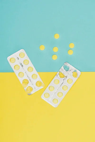 Top View Medicines Isolated Blue Yellow Background — Stock Photo, Image