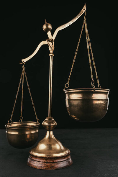 vintage justice scales isolated on black