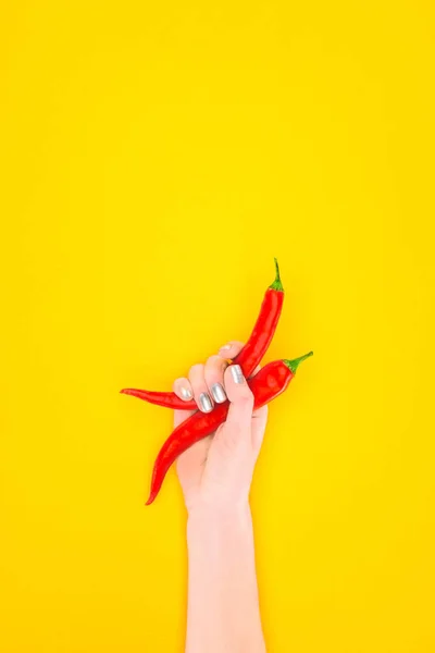 Cropped Shot Person Holding Red Chili Peppers Isolated Yellow — Stock Photo, Image