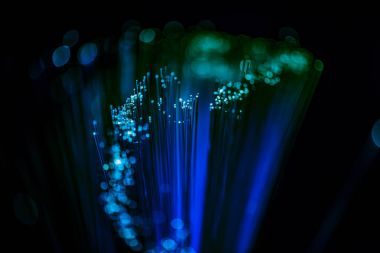 selective focus of glowing blue fiber optics texture background clipart