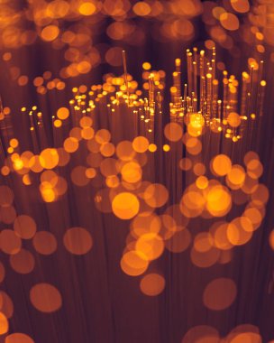 selective focus of bokeh orange fiber optics texture clipart