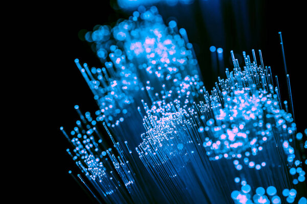 Close up of blurred blue fiber optics background