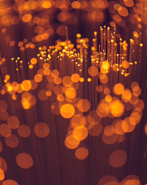 selective focus of bokeh orange fiber optics texture