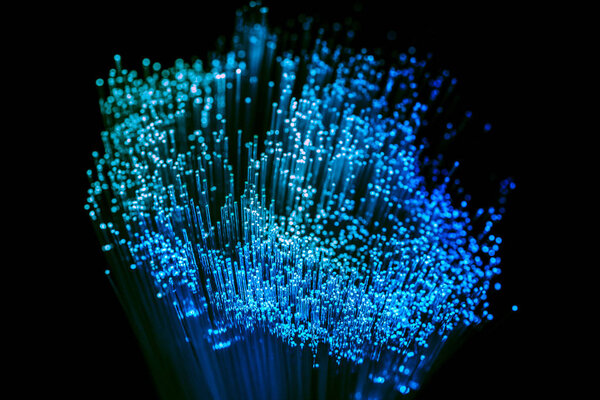 glowing blue fiber optics background