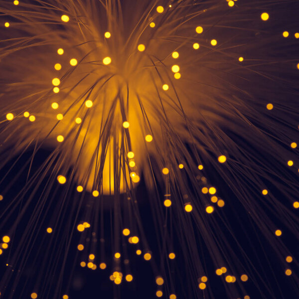 shiny orange fiber optics background