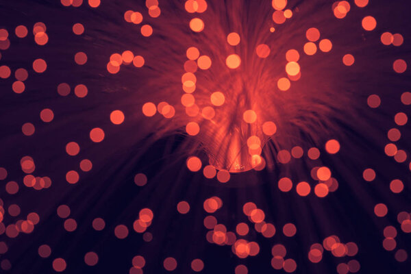 blurred glowing red fiber optics texture 