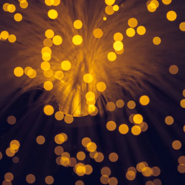 Close Blurred Glowing Orange Fiber Optics Texture — Stock Photo, Image