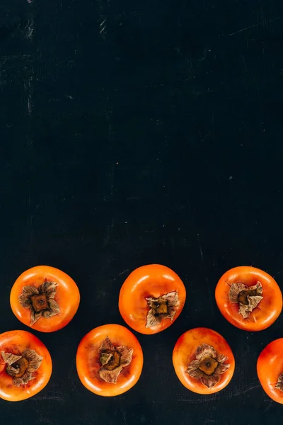 Top View Persimmons Rows Black — Stock Photo, Image