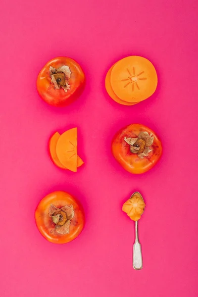 Top View Persimmons Pieces Spoon Isolated Pink — Stock Photo, Image