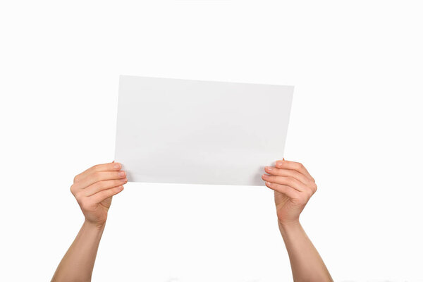 Cropped image of woman holding empty paper isolated on white