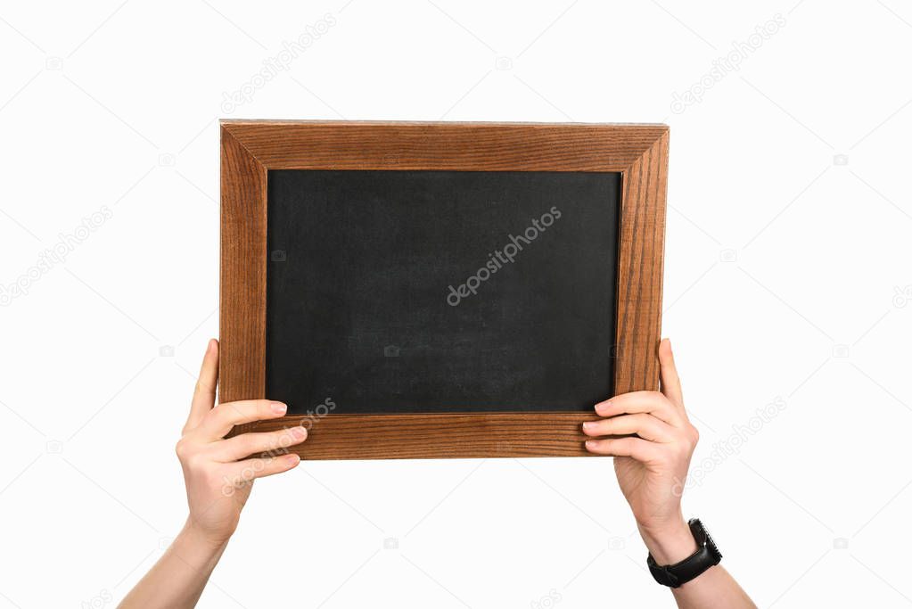 Woman holding empty chalkboard isolated on white