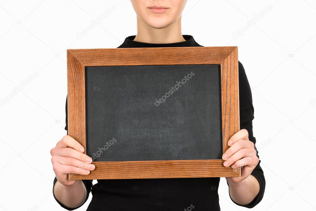 Cropped view of woman holding empty board isolated on white