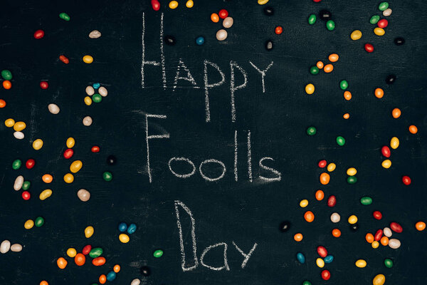 Flat Lay Sweets Happy Foolls Day Lettering Black Tabletop Stock Photo