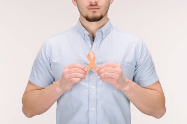 partial view of man with orange leukemia, kidney cancer, multiple sclerosis RSD awareness ribbon isolated on white clipart