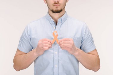 partial view of man with orange leukemia, kidney cancer, multiple sclerosis RSD awareness ribbon isolated on white clipart