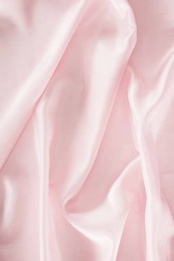 light pink shiny satin fabric background clipart
