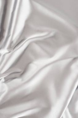 light silver crumpled shiny silk fabric background clipart