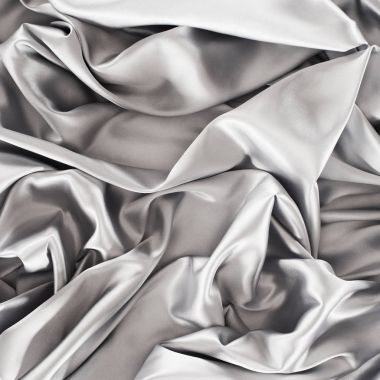 silver crumpled shiny silk fabric background clipart