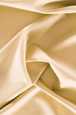 beige crumpled shiny silk fabric background clipart