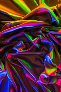 colored crumpled shiny satin fabric background