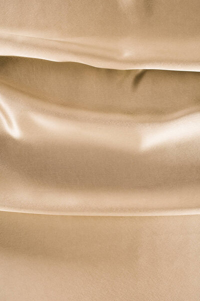 золотистый блестящий атласный фон
