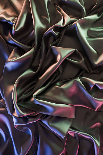 colored crumpled soft satin fabric background