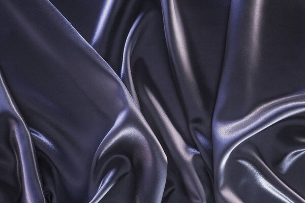 dark violet shiny silk fabric background