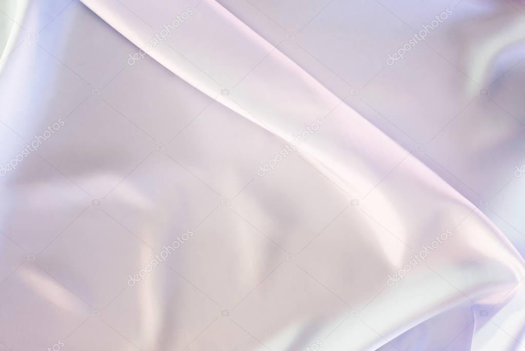 light beige and pink shiny satin fabric background