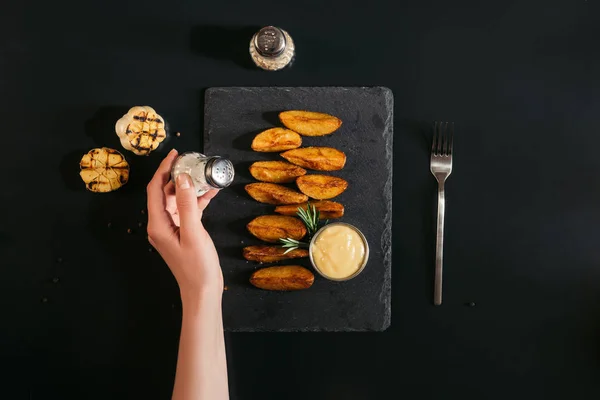 Partial Top View Person Holding Salt While Eating Tasty Baked — Stock Photo, Image