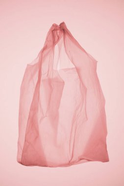 pastel pembe altında boş şeffaf plastik torba hafif tonda