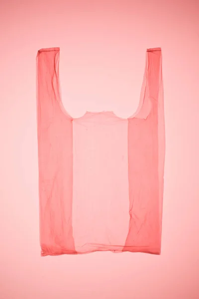 Saco Plástico Transparente Sob Luz Tonificada Rosa — Fotografia de Stock