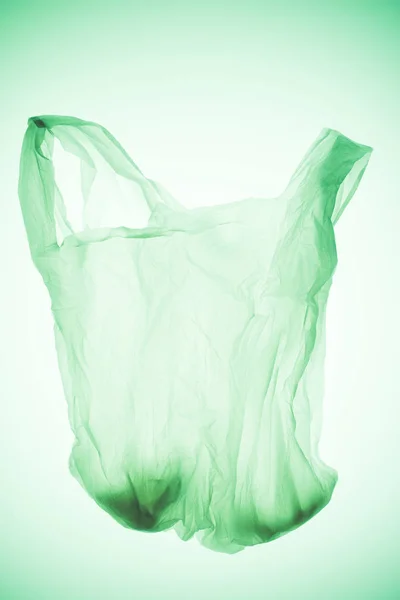 Saco Plástico Transparente Vazio Sob Luz Verde Tonificada — Fotografia de Stock