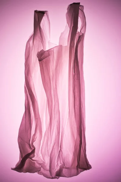 Bolsa Plástico Transparente Bajo Luz Tonificada Rosa — Foto de stock gratis