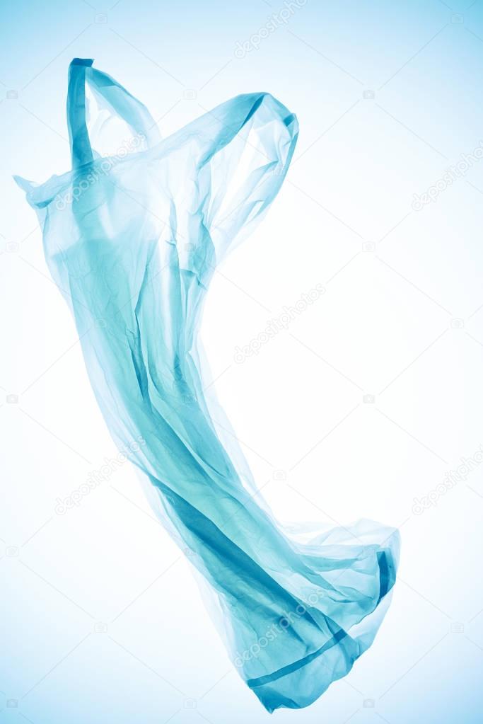 crumpled  plastic bag under blue toned light