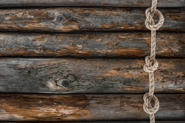 Вид Зверху Морську Мотузку Вузлами Гранжевій Дерев Яній Поверхні — стокове фото