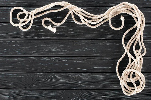 Top View Arranged White Marine Ropes Knots Dark Wooden Tabletop — Free Stock Photo