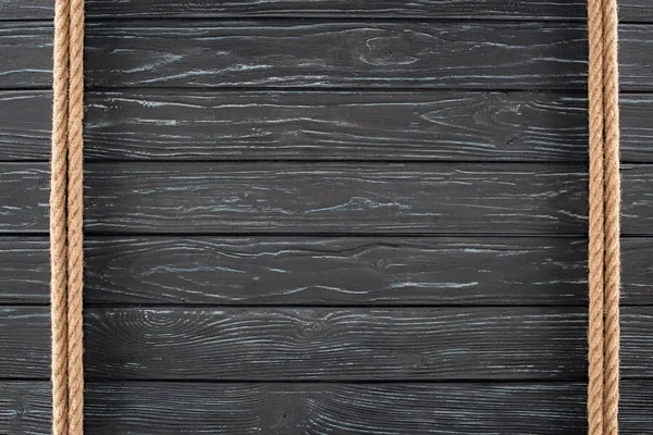 Vista Superior Cordas Marrons Superfície Madeira Escura — Fotografia de Stock