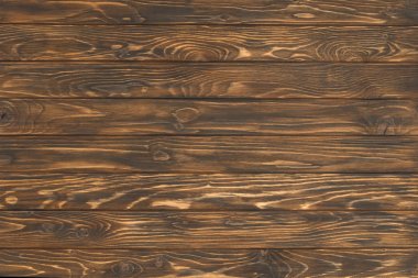 Wooden planks painted in brown background clipart