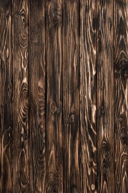 Rough background of detailed brown wooden planks surface clipart